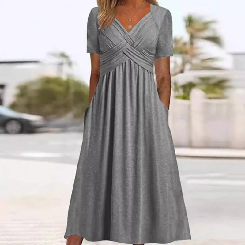 👗 Dámske dlhé šaty s výstrihom do V a krátkymi rukávmi 🌸 Elegantný splývavý strih, pohodlný materiál a nenáročný štýl pre každodenné nosenie